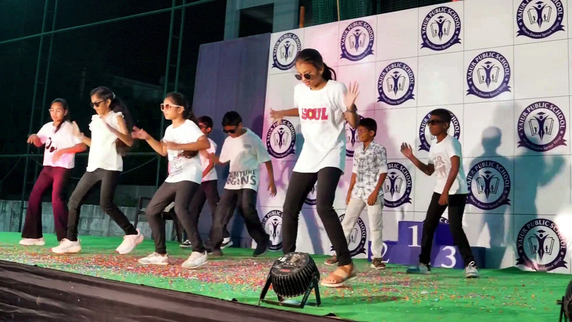 Students dancing on stage at the Yajur annual celebration